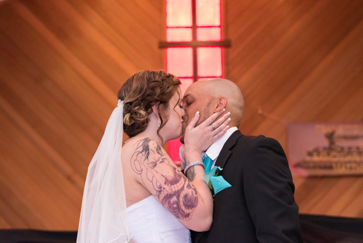 bride and groom kiss photography